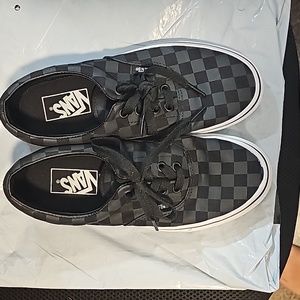 Black checkered Vans